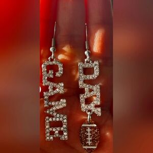 Game Day football rhinestone earrings.